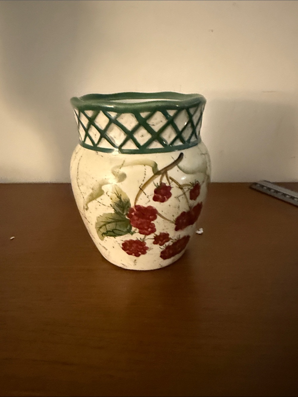 Raymond Waites Cornucopia Vase Burgundy Flowers